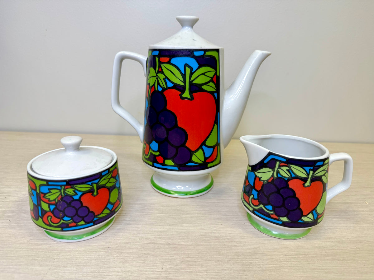 Juego de café/té de cerámica con estampado de frutas de los 70